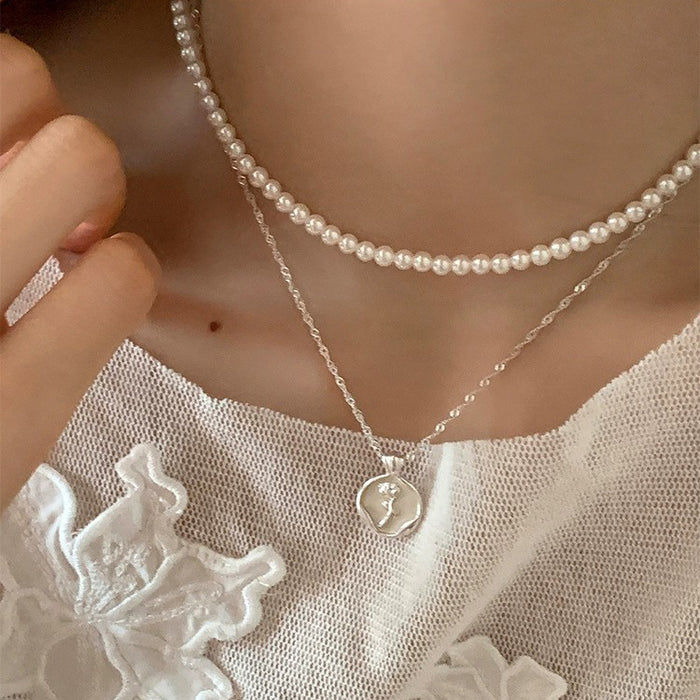 Wholesale Light luxury, gentle, niche design, tulip pearl necklace, pure silver versatile sweater chain, layered and elegant