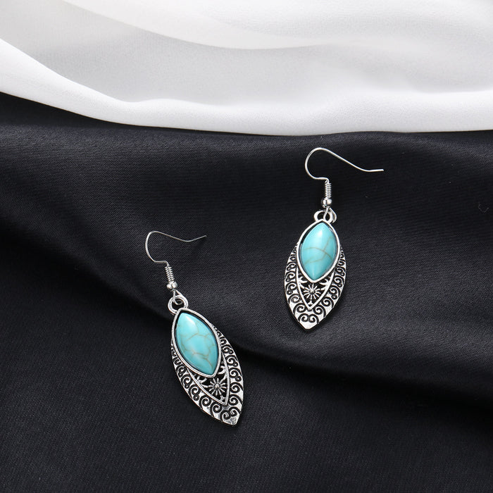 Wholesale Vintage turquoise oval carved openwork earrings