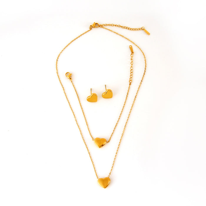 Wholesale Fashion classic stainless steel heart necklace bracelet earrings three piece set wholesale solid pendant