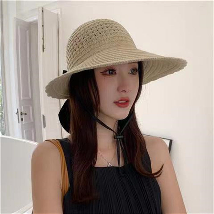 Wholesale New curled edge hollow knitted sun hat temperament bow top hat large brim foldable fisherman hat