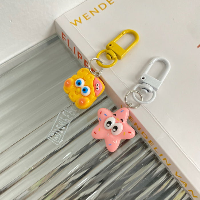 Wholesale Resin Couple Cartoon Handmade Keychain 2024 New Cute Sponge Doll Small Pendant Student Explosive Accessories