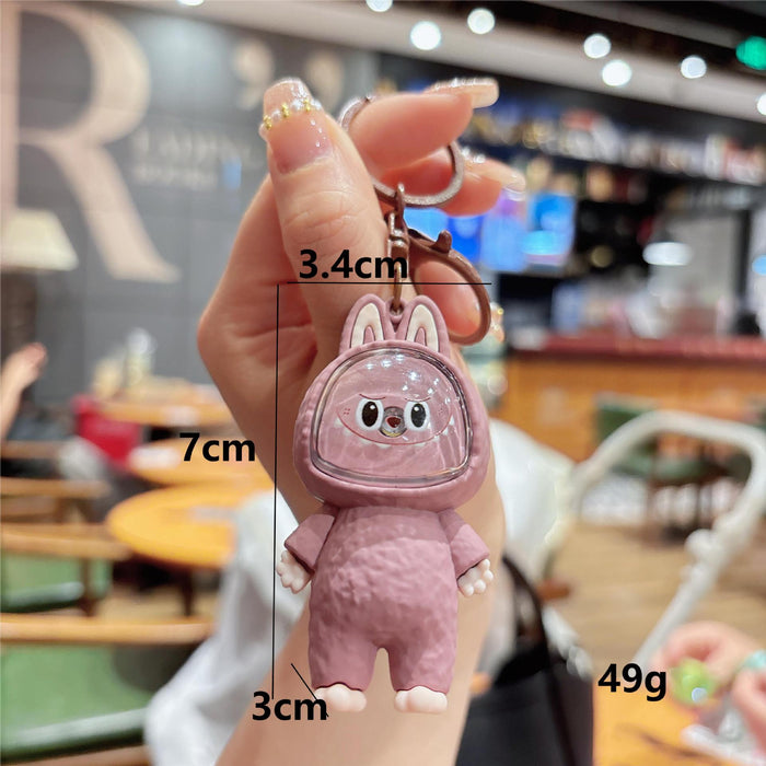 Wholesale Creative cartoon illuminated keychain figurine, car couple bag pendant, student backpack ornament