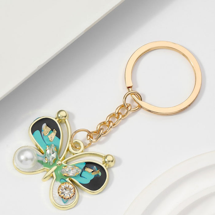 Wholesale Alloy Inlaid Diamond Pearl Butterfly Keychain JDC-KC-RongRui066