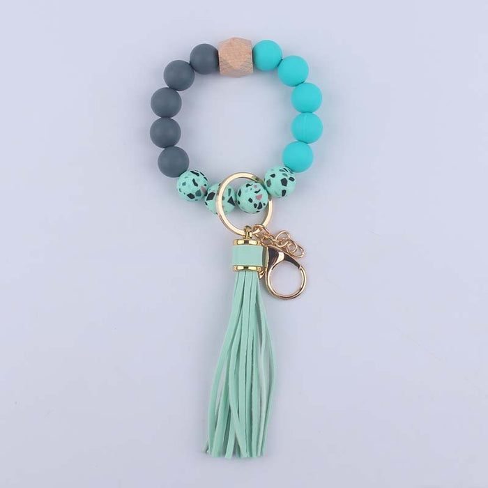 Wholesale Silicone leopard beads wrist keychain pendant leather PU tassel beaded bracelet accessories