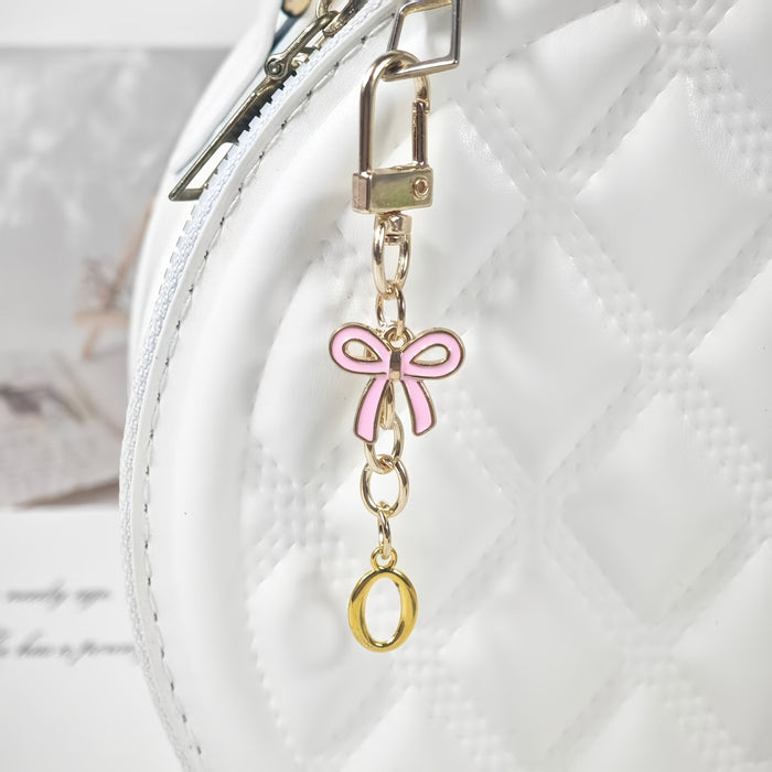Wholesale Pink bow A-Z keychain alloy accessory