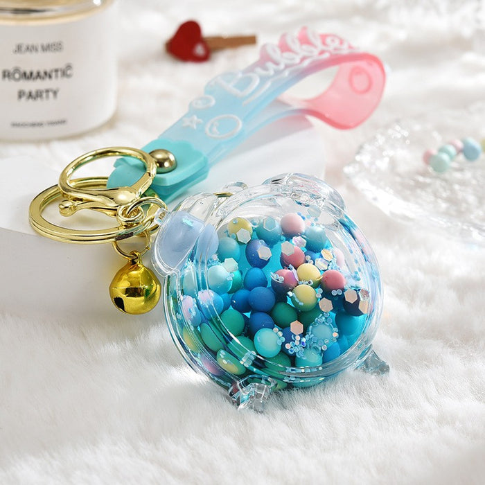 Wholesale Acrylic oil bottle candy Bean astronaut keychain