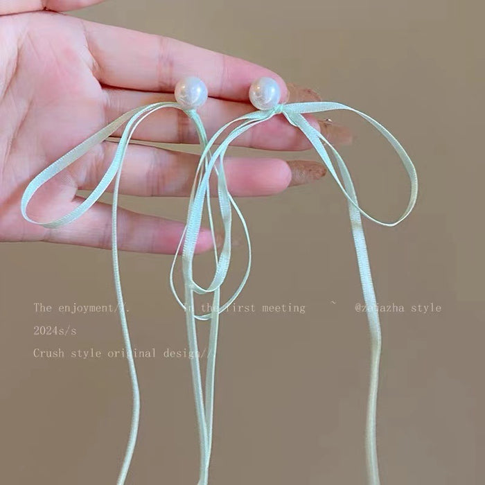 Wholesale Pearl ribbon earrings, bow earrings, niche, unique and sweet earrings
