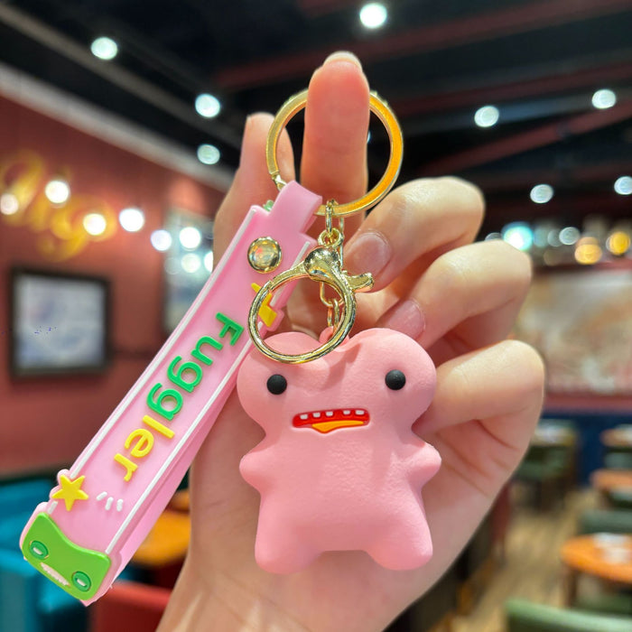 Wholesale Cartoon cute monster series girls cute keychain pendant funny doll keychain student doll small pendant