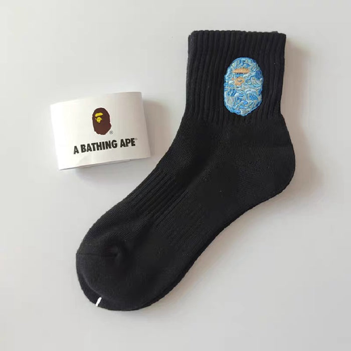 Wholesale Medium length towel bottom socks, high top sports long tube, embroidered white