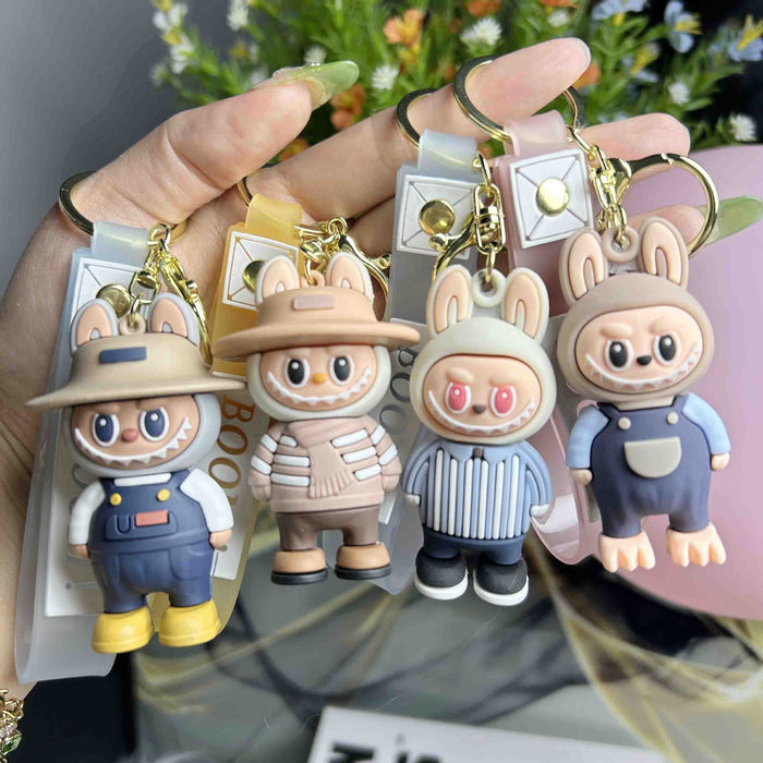 Wholesale Cartoon soft plastic cute little monster keychain pendant small gift ornaments,  back to school season