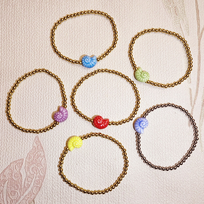 Wholesale Swimming wearable mini bracelet accessory ceramic conch animal turtle titanium steel non fading bracelet