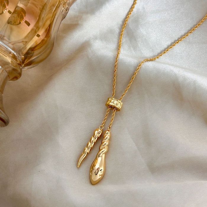 Wholesale Gold long drawable twisted necklace accessory, light luxury, niche, high-end, temperament pendant, sweater chain