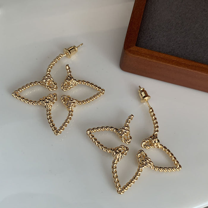 Wholesale Hollow earrings exude a ladylike and elegant vibe, while leaf earrings exude a refined and sophisticated vibe