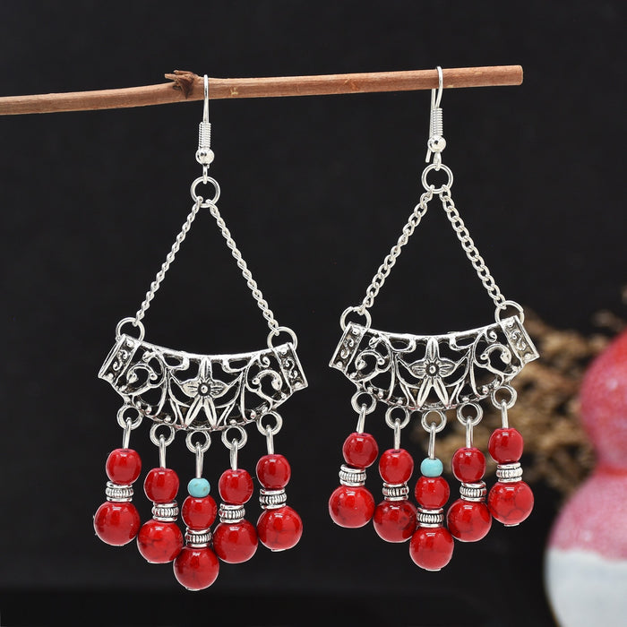 Wholesale Tassel earrings with hollowed out hidden silver earrings