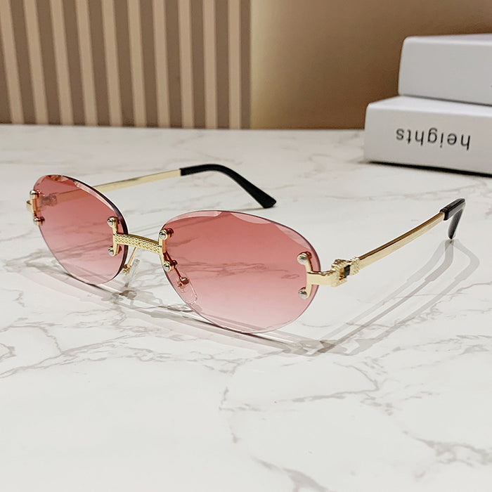 Wholesale Frameless cut sunglasses, fashionable oval frame glasses, gradient sunglasses