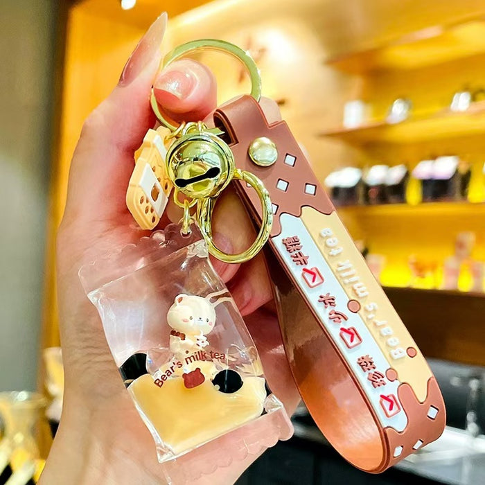 Wholesale bubble tea keychain floating small milk bear liquid quicksand bottle pendant couple gift bag hanging ornaments for women