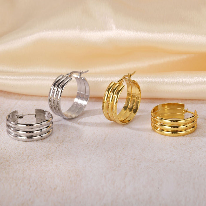 Wholesale Geometric Titanium Steel Three-Line Dense Earrings