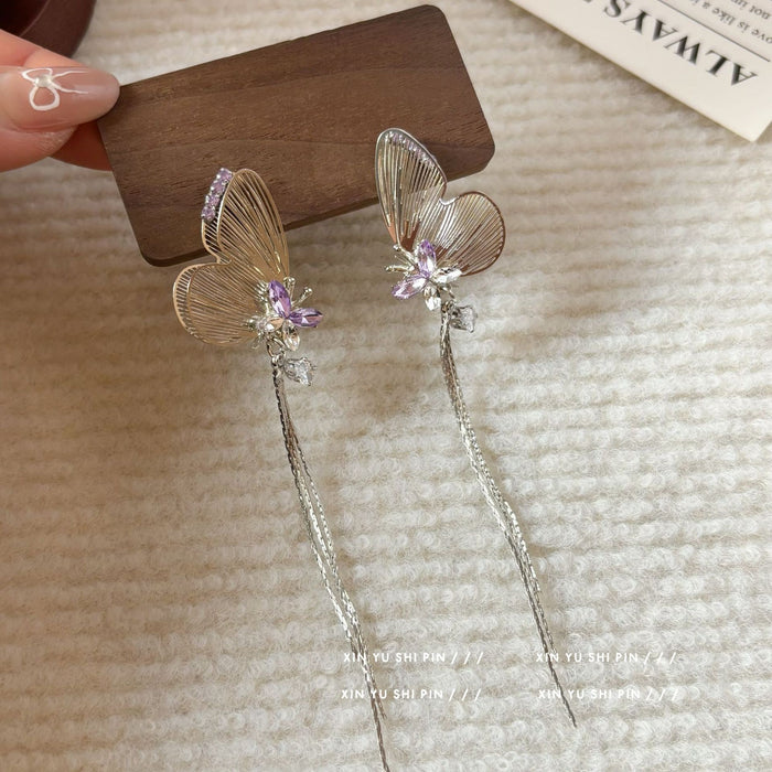 Wholesale Sparkling diamond dynamic hollow butterfly tassel earrings, light luxury temperament, high-end feeling, niche earrings, exaggerated earrings