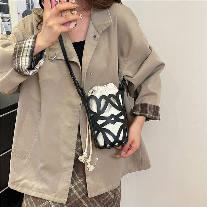Wholesale  Autumn Street Style Hollow Cylinder Drawstring Bag Black P. U.  Medium Fashion Accessory