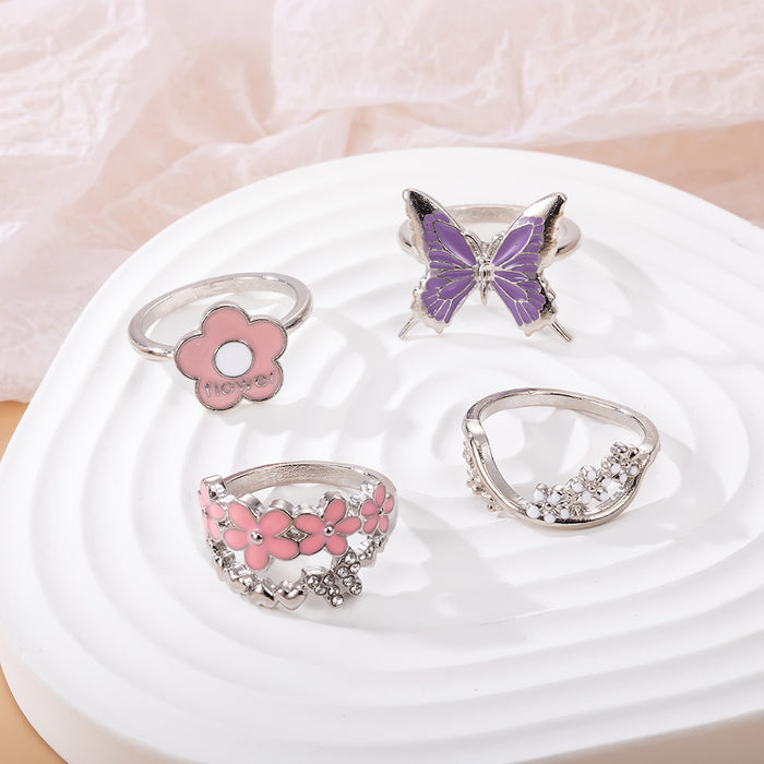 Wholesale Pink Flower Purple Butterfly Diamond Drop Oil 4-piece Ring Set JDC-RS-KeR008