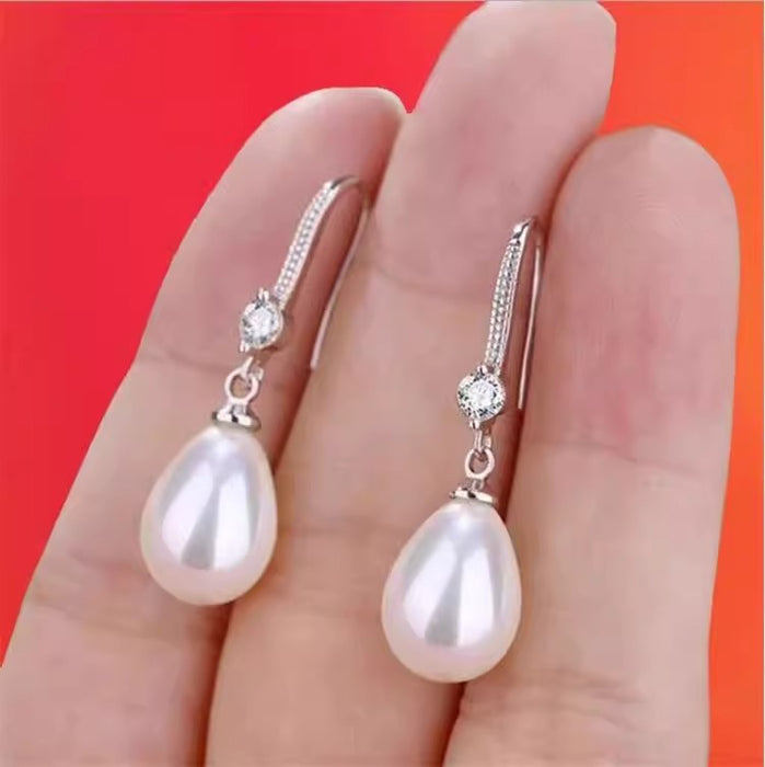 Wholesale Pure silver earrings with temperament, pearl earrings with hooks, long style, atmospheric and high-end earrings