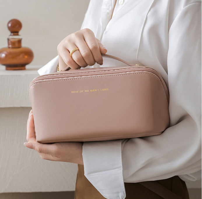 Wholesale Fashionable PU Pillow Bag, Portable Travel Storage Bag, Large Capacity Toilet Bag, Hand Enhancement Makeup Bag