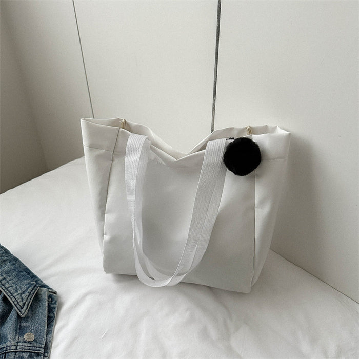 Wholesale Solid color large capacity canvas shoulder bag, simple commuting tote bag, shopping bag