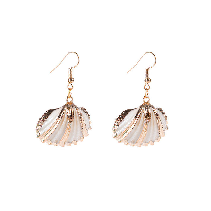 Wholesale New gold trimmed conch seashell earrings with multiple options to choose from