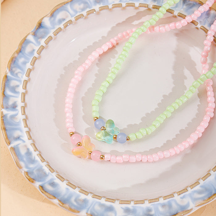 Wholesale Jewelry fashion resin bead handmade necklace sweater chain versatile butterfly collarbone chain pendant