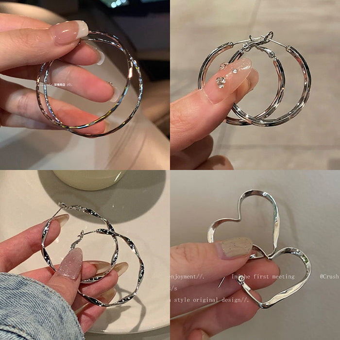 Wholesale 
High end irregular circle earrings for women, light luxury, niche design, exaggerated temperament, ear loops, ear buckles, and earrings