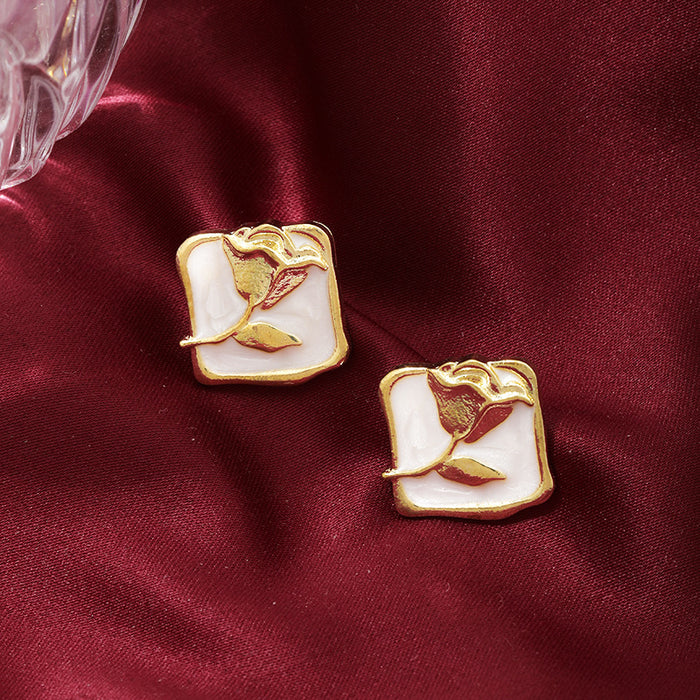 Wholesale Vintage rose silver needle earrings autumn and winter new item niche painting oil rose flower wholesale