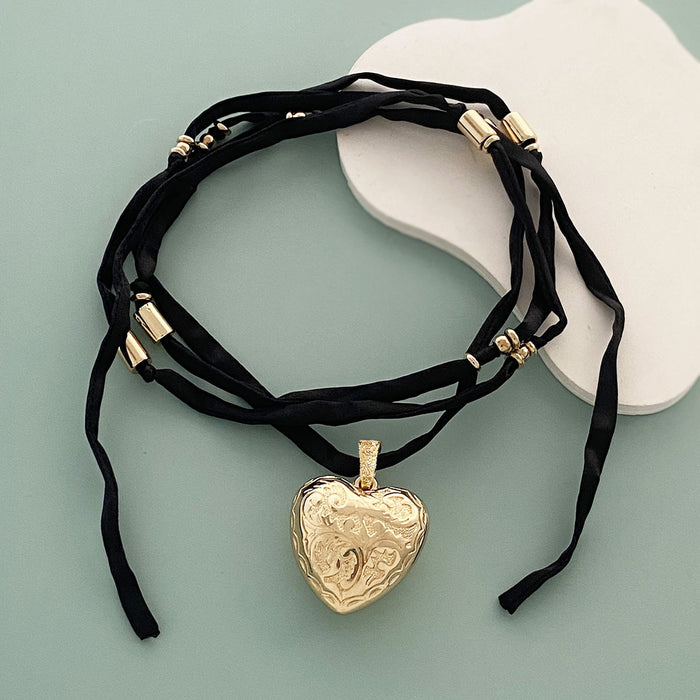 Wholesale three-dimensional relief love pendant long fabric trend necklace fashion