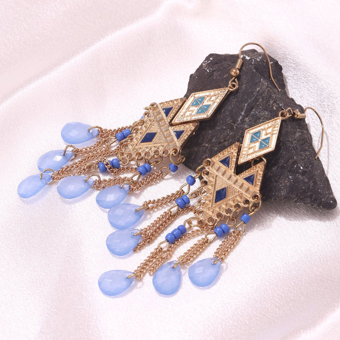 Wholesale Long tassel chain earrings, fashionable and personalized feather earrings, niche ethnic style ear hooks and earrings