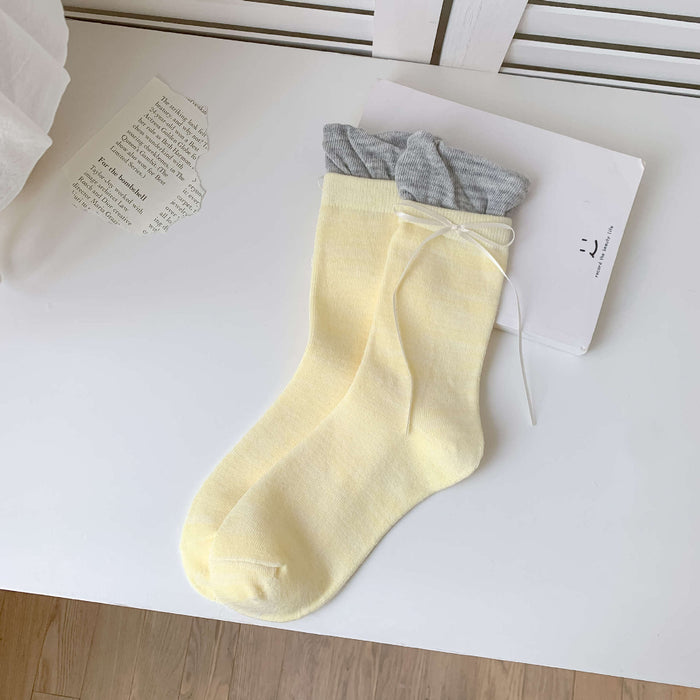 Wholesale Colorful bow tie pile socks, cute and versatile socks