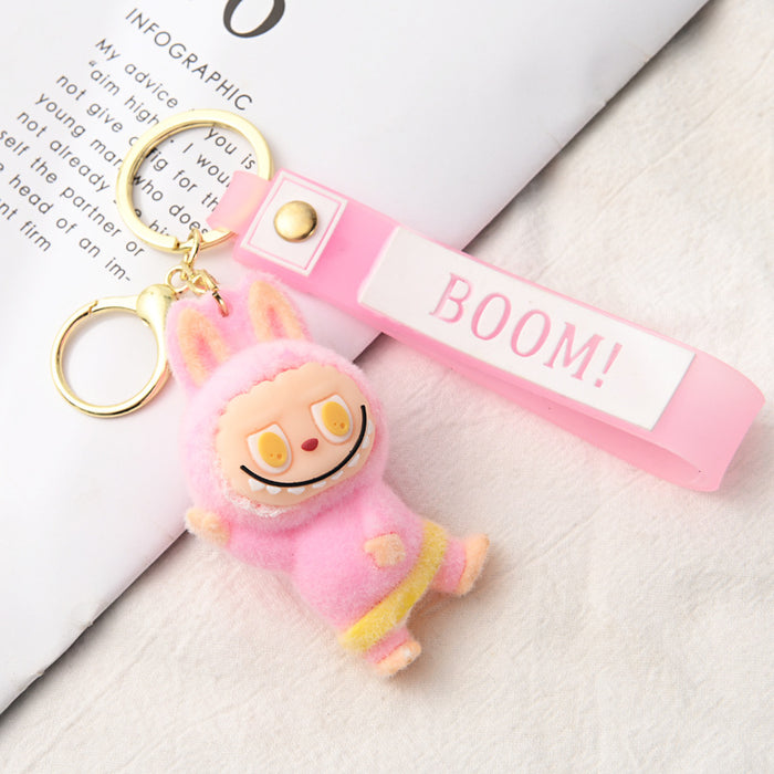 Wholesale Flocking Yoga Little Monster Keychain Small Pendant Cartoon Cute Doll Keychain Small Gift