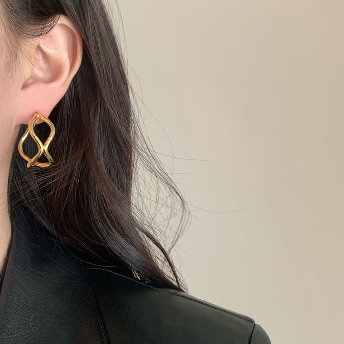 Wholesale Personalized, simple, fashionable style, irregular geometric winding earrings, silver needle temperament, light luxury earrings for women