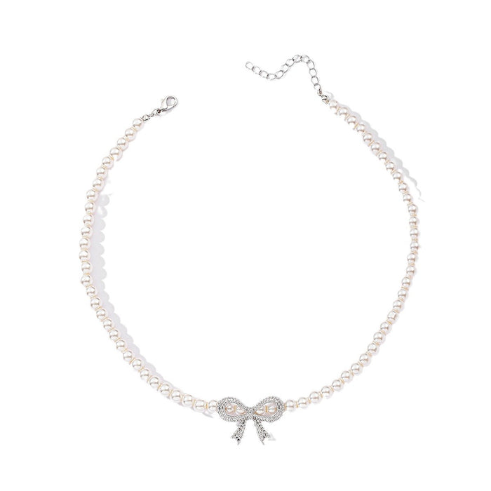 Wholesale Jewelry Fashion Pearl Necklace Versatile Diamond Set Bow Sweater Chain Versatile Pendant
