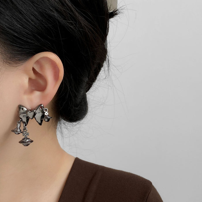 Wholesale Fashionable design earrings, personalized bow, metal, exaggerated personality