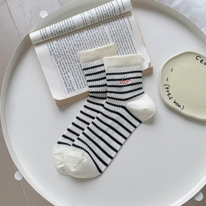 Wholesale Ultra transparent fine striped embroidered versatile mid length socks