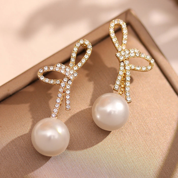 Wholesale Pearl earrings new niche design temperament earrings simple and versatile bow earrings