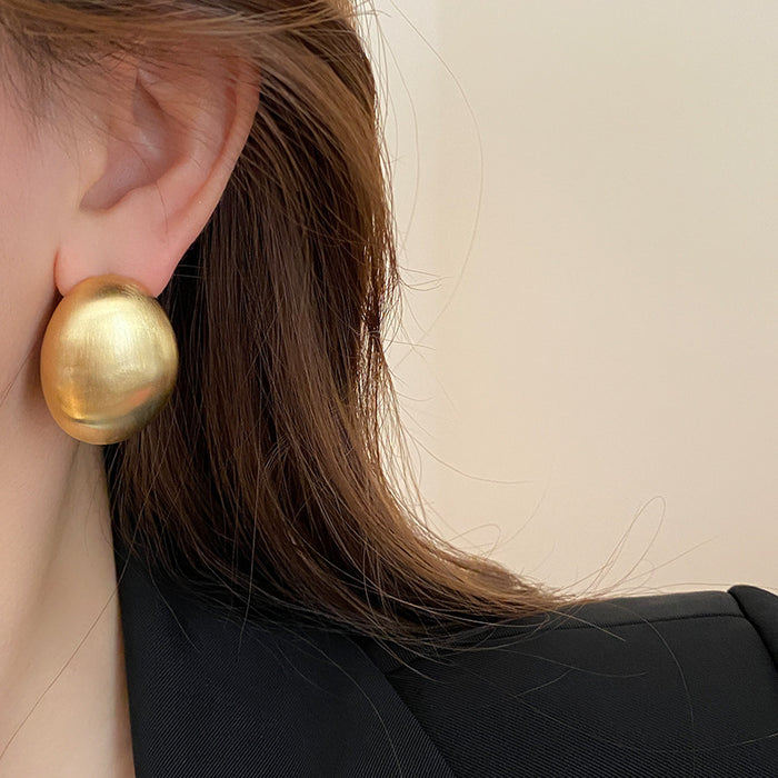 Wholesale Metal brushed earrings exaggerated temperament eardrop gold curved female earrings