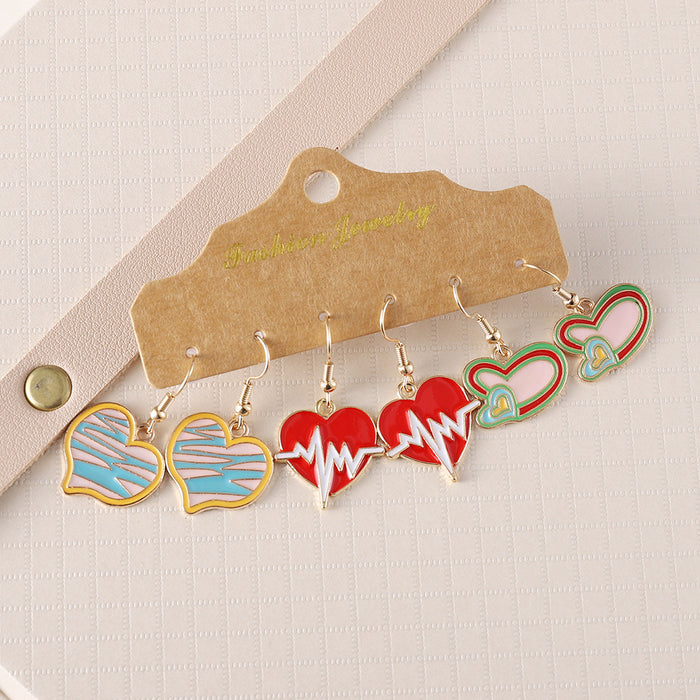 Wholesale Valentine' s Day Love Bear Rose Church Love Heartbeat Pendant Oil Dropping Earrings suit Earrings