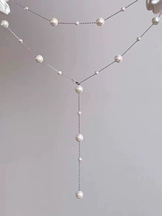 Wholesale Sweater chain pearl long versatile collarbone chain light luxury niche tassel necklace