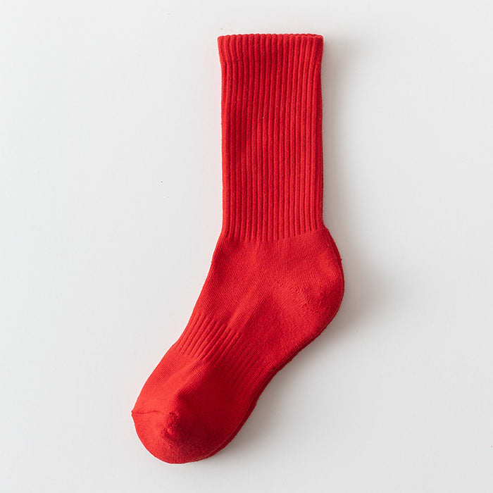 Wholesale Solid color high elastic looped socks for men and women, long socks for sports, cotton socks