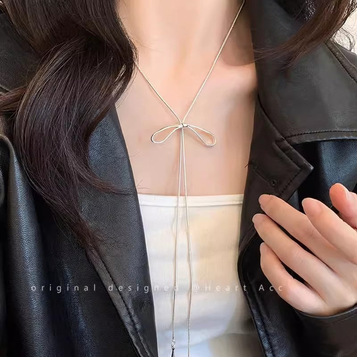 Wholesale Silver bow necklace for women, simple and cool style, long accessory with temperament, collarbone chain