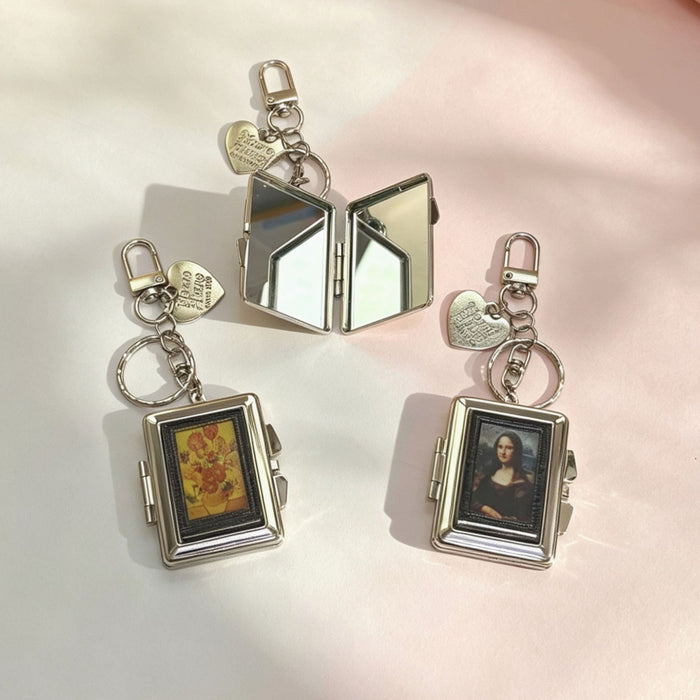 Wholesale Double-Sided Cosmetic Mirror Mona Pattern Bag Charm Keychain Zinc Alloy Boutique
