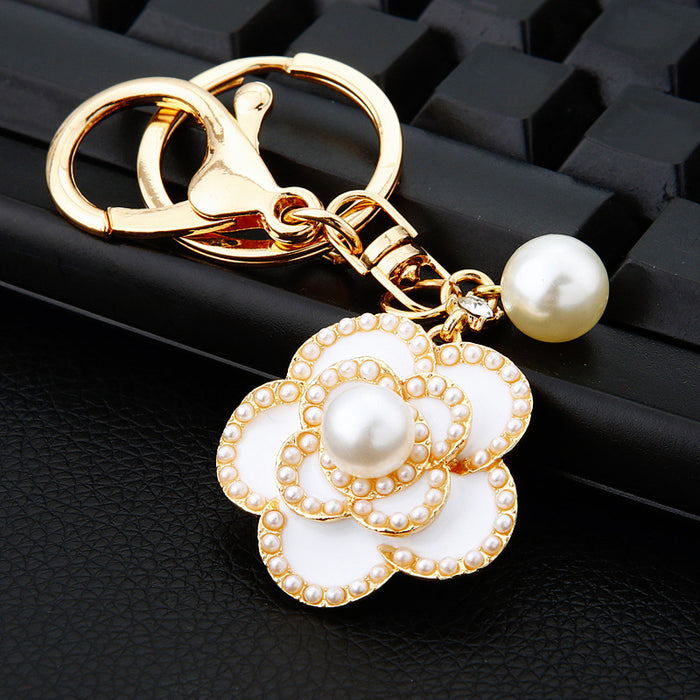Wholesale Camellia car keychain pendant, metal keychain ring, diamond inlaid pearl rose pendant