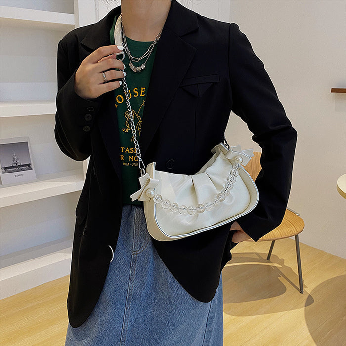 Wholesale Popular pleated new fashion pearl chain shoulder crossbody bag, saddle bag