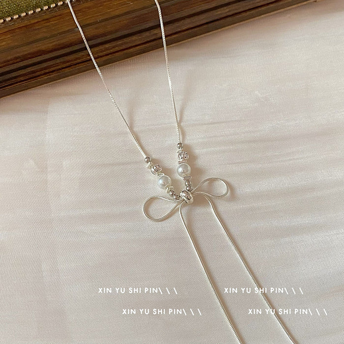 Wholesale Super beautiful bow long necklace, light luxury temperament, niche collarbone chain, fashionable and versatile necklace