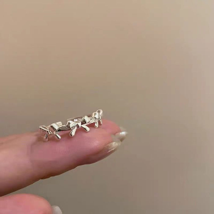 Wholesale Cold wind silver bow line ring for women, niche, exquisite, high-end, simple opening, adjustable ring